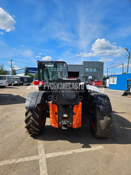 Купить Погрузчик телескопический BOBCAT TL38.70 б/у (2021 г.в., 9958 м*ч) (вилы+ковш 3м3) в компании Русбизнесавто - изображение 1